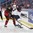 BUFFALO, NEW YORK - DECEMBER 27: Slovakia's Samuel Bucek #13 and Canada's Brett Howden #21 battle for the puck during preliminary round action at the 2018 IIHF World Junior Championship. (Photo by Matt Zambonin/HHOF-IIHF Images)

